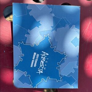 Team Alberta 2011 Canada Winter Games Blue Notebook with 4 pins